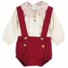 Baby boys cream colored long sleeve blouse with a flower print peter pan collar, maroon color suspender style romper on a white background.