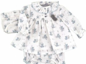 Baby girls kitty printed dress with a ruffled collar, button and pom pom details with a matching bonnet on a white background