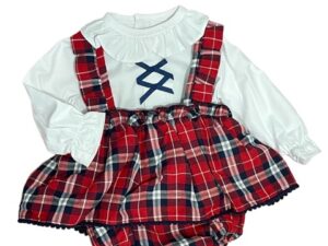 Baby girls white long sleeve blouse with a ruffled collar and wrists criss cross black ribbon design on the chest with a red, black and white gingham print overall ruffled dress on a white back ground.