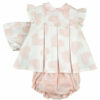 Pleated baby sweetheart dress set has the prettiest white and pink heart pattern with three pleats and buttons with a button closure back, scalloped peter pan collar and ruffled capped sleeve. Comes with a matching bonnet and bloomers on a white background