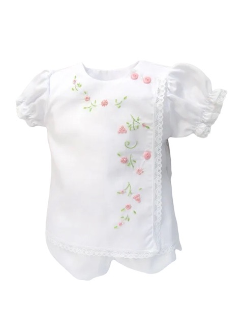 This is such a sweet white with pink baby set with intricate and dainty embroidered pink flowers with pearls, a touch of green embroidered leaves with delicate white lace border trim. The design has puffed and gathered short sleeves, button layered smock with the most beautiful matching ruffled bloomers. 65% polyester 35% cotton Made in Columbia Size- Preemie, Newborn Sold by Alz's Baby Boutique