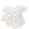 This sweet 3pc white with pink baby set has absolutely beautiful embroidered pink flowers with pearl details with elegant white lace and design on bodice with a cute pink satin ribbon bow. The dress has dainty puffed and gathered short sleeves with eyelet trim. Includes adorable matching bloomers and baby shoes. 65% polyester 35% cotton Made in Columbia Size- Preemie, Newborn