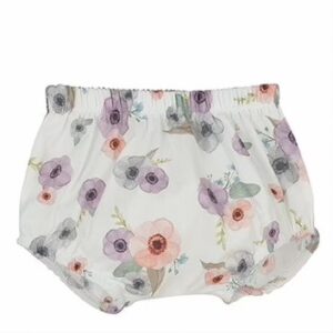 These adorable baby bloomers have the most precious purple, rose, blues and green poppy flower print with gathered legs and a stretchy waist. The back side of the diaper cover has the sweetest white eyelet ruffle with a pale pink trim. Perfect to mix and match with your favorite top. So many possibilities to create the cutest outfit. 100% cotton Made in Spain Size, 1m, 3m, 6m, 12m 