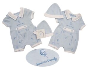 This tiny baby's romper set has a white pointed collar with a blue accent trim. The baby blue body has a cute embroidered candy design with button details and white trim. Has a button fastening back and snap closure legs. Comes with an adorable little baby cap. Perfect for your preemie. 65% polyester 35% cotton knit Made in the UK Size 3-5lbs, 5-8lbs Sold by Alz's Baby Boutique.