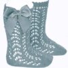 These are absolutely lovely openwork knee-high baby socks with an adorable large side bow. Perfect for baby to wear especially in spring-summer season. Comes in multiple colors. Size- Newborn 100 % cotton  Made in Spain Sold by Alz's Baby Boutique