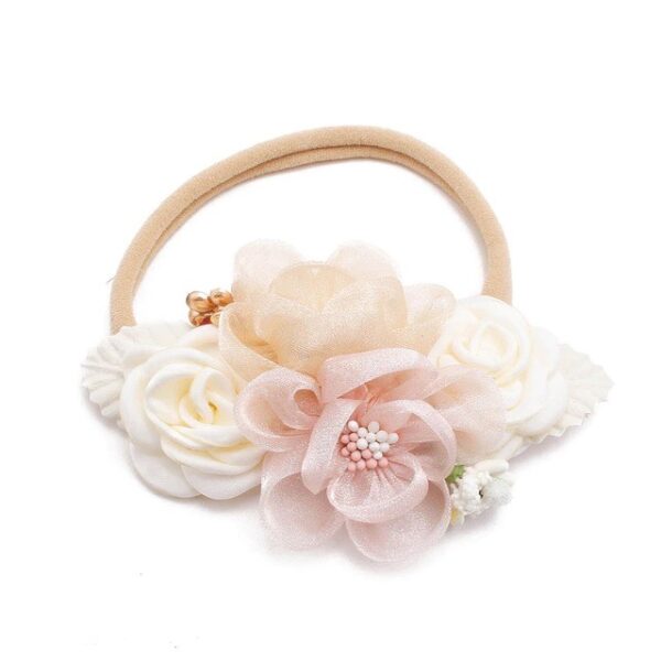 Baby girls newborn photography floral nylon headband sold by Alz's Nursery