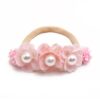 Baby girls newborn photography floral nylon headband sold by Alz's Nursery