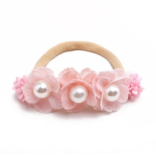 Baby girls newborn photography floral nylon headband sold by Alz's Nursery