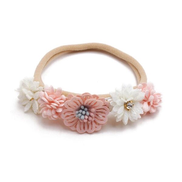 Baby girls newborn photography floral nylon headband sold by Alz's Nursery