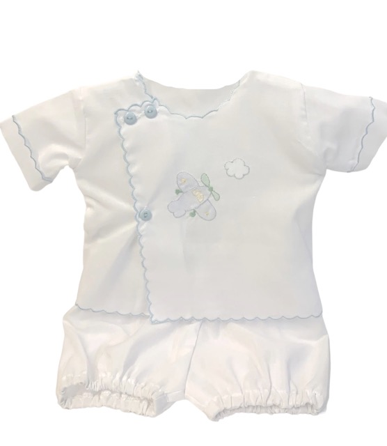 This is the most adorable white and blue baby boy wrap set with shadow embroidered blue airplane, with an elegant blue scalloped border trim, cuffed short sleeves, blue buttons and gathered trim on the legs of the bloomers. Simply stunning! 65% polyester 35% cotton Made in Columbia Size- Preemie Sold by Alz's Baby Boutique
