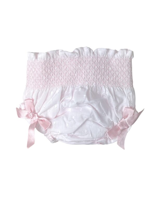 These beautiful double lined baby bloomers have the most gorgeous smocked waist line, a dainty texture, ruffled and gathered legs with double satin bows. Perfect to pair with your favorite top. 100 % cotton Made in Spain Comes in pink and white Size 1m Sold by Alz's Baby Boutique