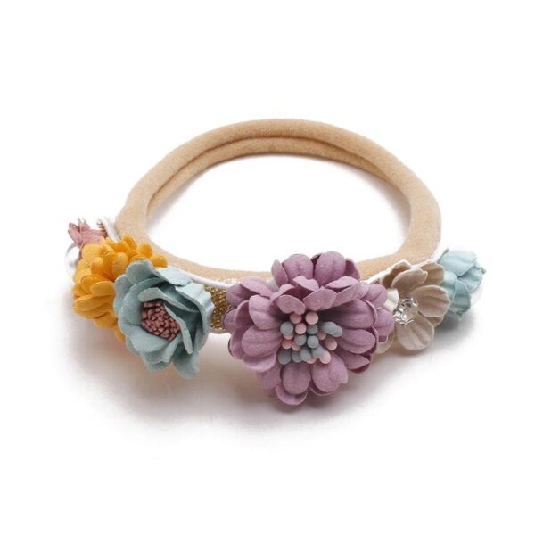 Baby girls newborn photography floral nylon headband sold by Alz's Nursery