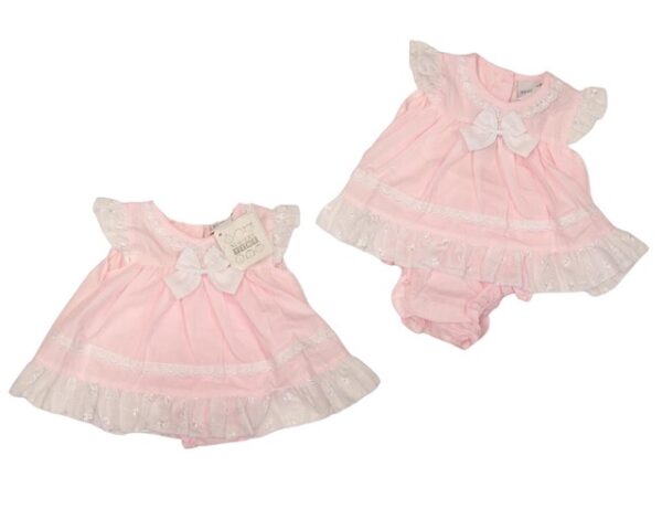 This tiny baby's dress has a beautiful soft pink color with white short ruffled capped sleeves and trim, intricate scalloped design details throughout, a sweet bow with a button closure back and matching bloomers. Such an adorable preemie set. 65% polyester 35% woven cotton Made in the UK Size 3-5lbs, 5-8lbs Sold by Alz's baby Boutique.