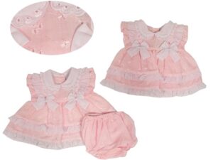 This tiny baby's dress set is absolutely stunning with the flower design broderie detail throughout the multiple pink layers of material. Trimmed with beautiful scalloped eyelet white lace, bows and ruffles. Has a sweet ruffled short sleeve and matching bloomers. A perfect set for your preemie. 65% polyester 35% woven cotton Made in the UK Size 3-5lbs, 5-8lbs Sold by Alz's Baby Boutique