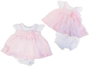 This tiny baby's dress features a layered white and pink design with embroidered detailing beautiful rose bud flower and tons of ruffles. This set has a gathered short sleeves with a scooped neck, buttons at the back with matching bloomers with a gathered legs making this one adorable preemie set. 65% polyester 35% woven cotton Made in the UK Size 3-5lbs. 5-8lbs Sold by Alz's Baby Boutique.