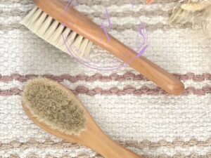 This sweet baby brush absolutely has the softest bristles with a bamboo handle. Length 6" with the widest part of the head of the brush being 1 1/2" wide. Sold by Alz's Baby Boutique