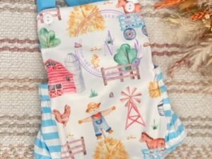 This is the cutest baby boy romper with an adorable farm style print with scarecrows, horses, dicks, windmills, barns, trees and more. Perfect for any little one. Size 6m Sold by Alz's Baby Boutique