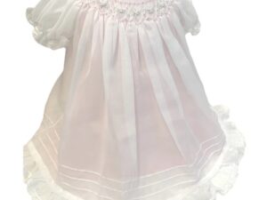 This is absolutely the most gorgeous pink bishop preemie dress with sweet little embroidered pink and white rosettes over the smocking, a beautiful white sheer overlay with a pink lining. Includes the prettiest matching smocked bonnet. Simply stunning for your special baby. 65% polyester 35% cotton Made in Columbia Size- Preemie Sold by Alz's Baby Boutique