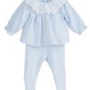 This adorable two piece gaiter set has a beautiful textured print with gathered long sleeves and an eyelet ruffled collar. Perfect for any occasion. Available in baby blue or a soft pink color. 100% cotton Made in Spain Size- Preemie Sold by Alz's Baby Boutique