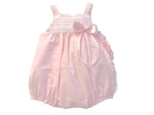 This is such an adorable bubble with elegant lace detailing, a sweet pink satin bow with pearl accents and a matching headband. Perfect for baby to wear alone or layer it with your favorite blouse. 65% polyester 35% cotton Made in Columbia Newborn in size. Sold by Alz's Baby Boutique