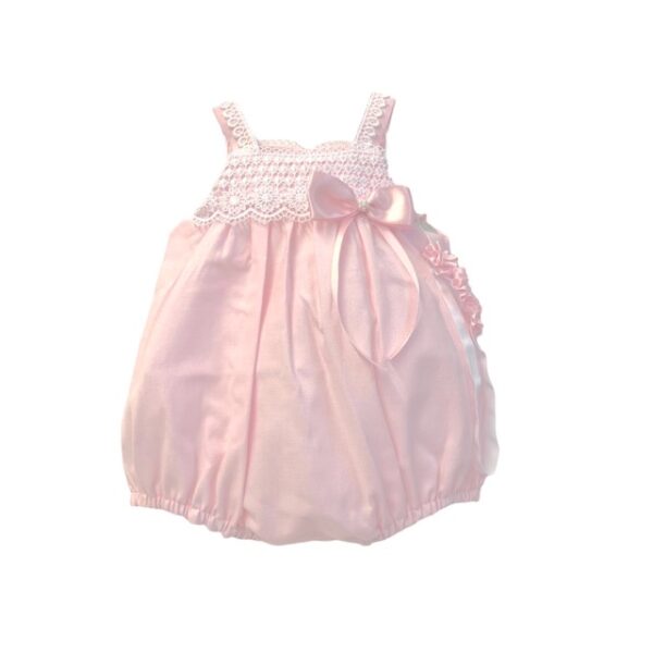 This is such an adorable bubble with elegant lace detailing, a sweet pink satin bow with pearl accents and a matching headband. Perfect for baby to wear alone or layer it with your favorite blouse. 65% polyester 35% cotton Made in Columbia Newborn in size. Sold by Alz's Baby Boutique