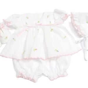 This sweet four piece white dress with multi color flowers includes a stunning dress, bloomer, bonnet and baby shoes. All with embroidered pastel color flowers with individual stems. Has a delicate satin ribbon inserted in a white lace white ribbon bow accent. Pink scallop border trim with short puffed and gathered sleeves. Comes in sizes preemie and newborn. Made in Columbia Sold by Alz's Baby Boutique