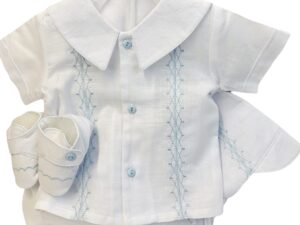 This adorable heirloom quality baby boys set comes with the cutest beret, blouse, bloomers and soft shoes. The knit features gorgeous blue embroidery  on soft white. The top has has short sleeves,the cutest buttons and a puritan collar. Made in Columbia Sold by Alz's Baby Boutique