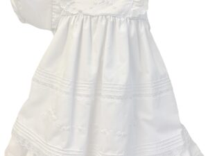 Delicate heirloom dress has layers of delicate lace trim, with beautiful embroidered flowers and tiny pearl accent. Has rows of pleated details around the entire dress. Buttons and ties at the back with sash bow. Made in Columbia Poly cotton blend Sold by Alz's Baby Boutique
