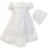 An absolutely beautiful baby gown with delicate embroidered flowers over rows of organza detail, lace inset with delicate lace border trim, has rows of tiny pleated design. Gathered puffed short sleeves trimmed with lace. Fully lined. Includes a matching bonnet. Made in Columbia Poly cotton blend.  Sold by Alz's Baby Boutique