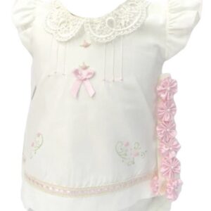 This sweet ivory dress set has the most intricate lace collar, pink embroidered flower details and pink dainty ribbons inserted along the border of the dress. Includes a matching pair of bloomers and a pink flowered headband with pearl accents. 65% polyester, 35% cotton Made in Columbia sold by Alz's Baby Boutique