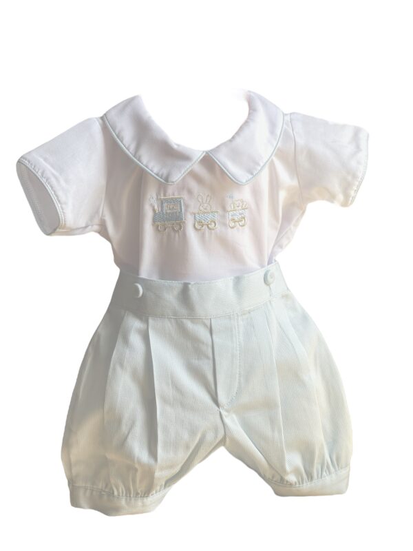 This is simply the cutest white with blue, baby boys two piece heirloom embroidered romper set! Featuring adorable embroidered bears and bunny on a blue embroidered train. A handsome white blouse with a blue stripe border piping . Elastic back on blue romper with a peter pan collar. Made in Columbia 65% Polyester, 35% Cotton Size- Newborn Sold by Alz's Baby Boutique